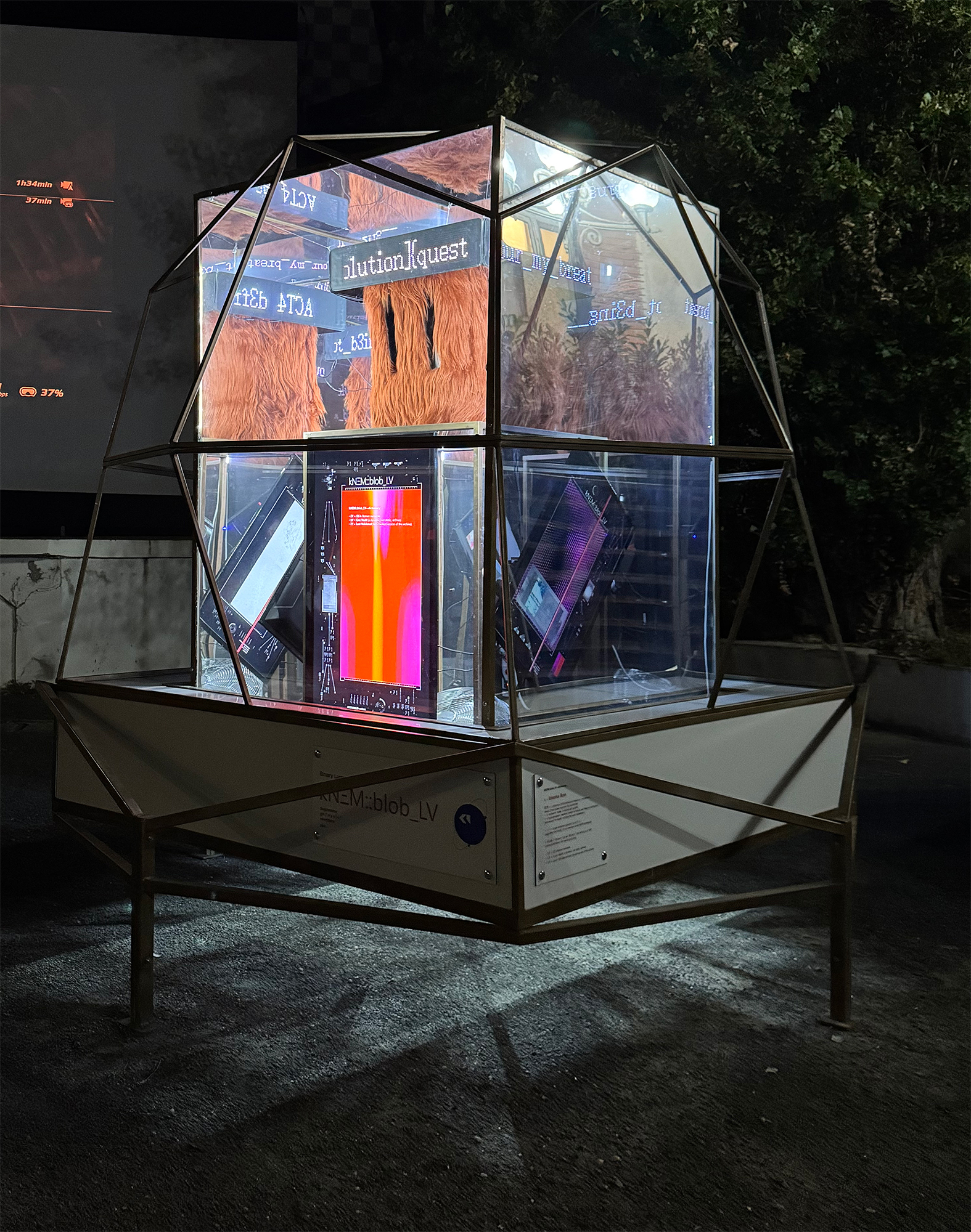 kNΞM::blob_LV — geodesic glass monument, night view