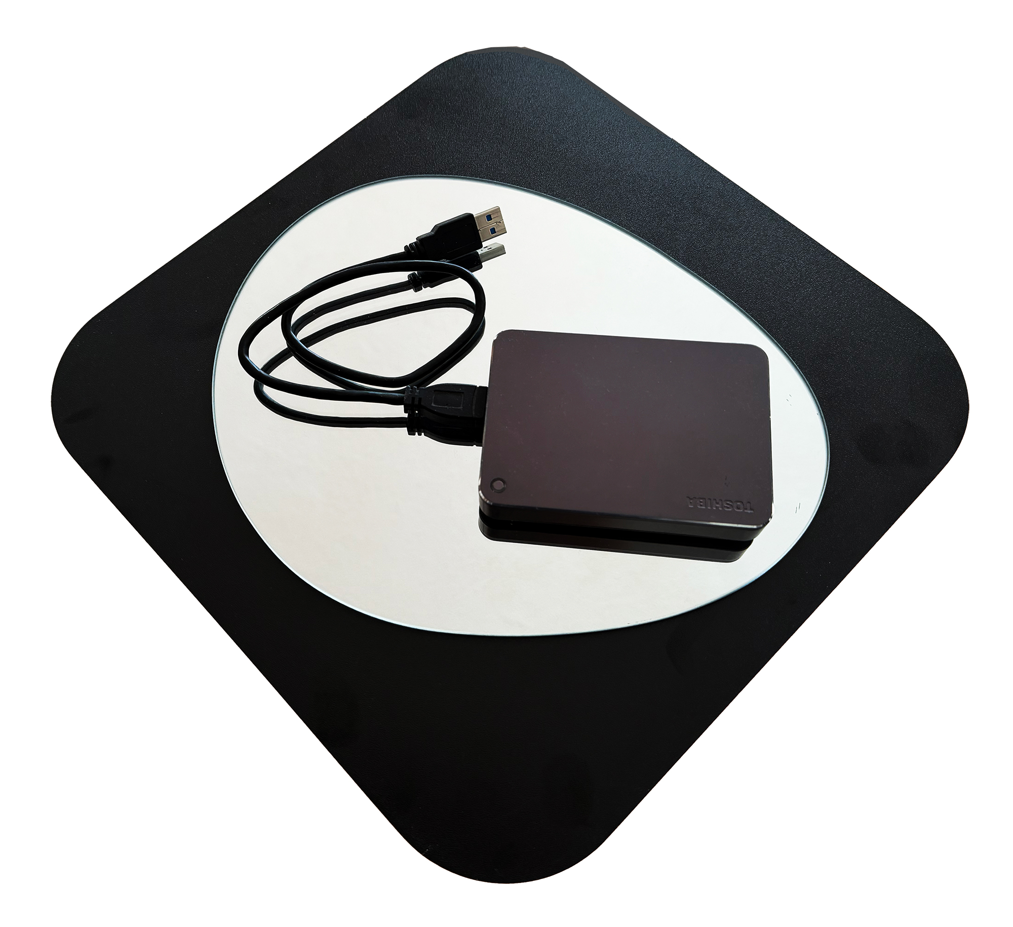 survival ki /HDD5 — portable hard drive on a diamond-shaped mat